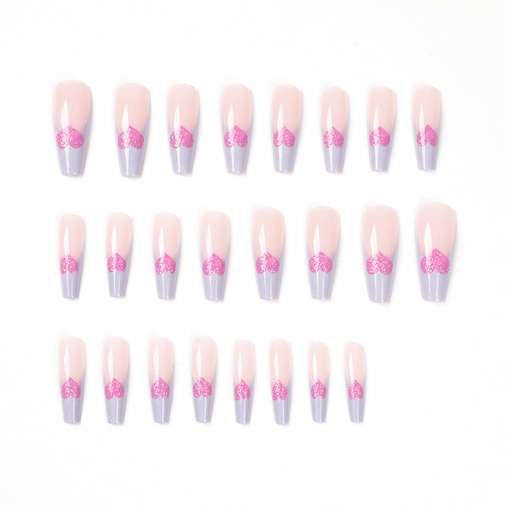 Artful stiletto nails with colorful heart designs Kalsten