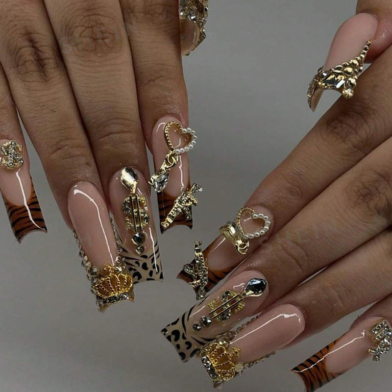 Artificial nail set with elegant golden and animal decorations Kalsten