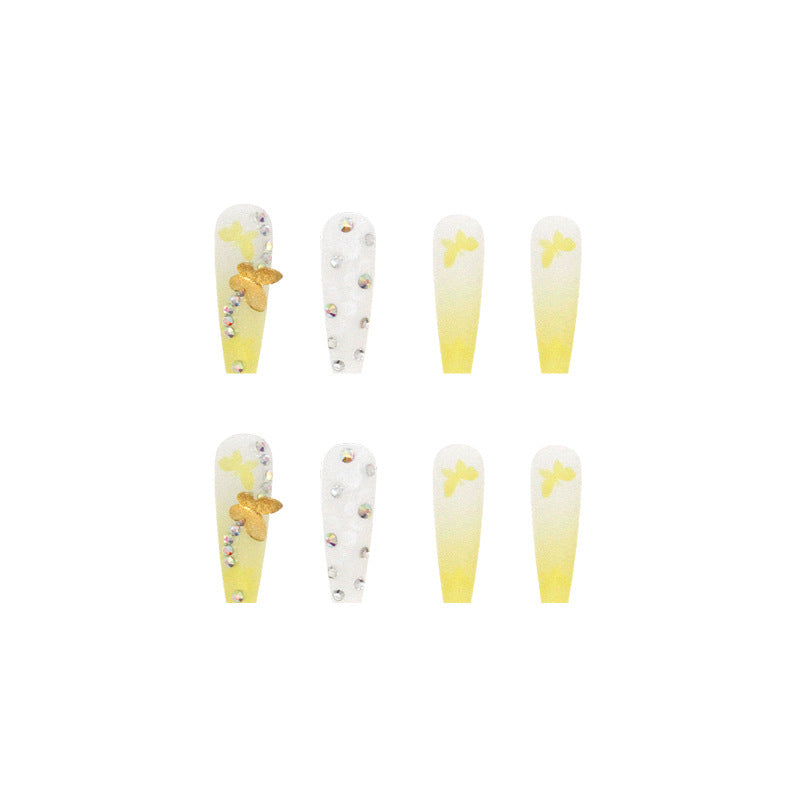 Artificial nail extensions with floral accents and rhinestones Kalsten