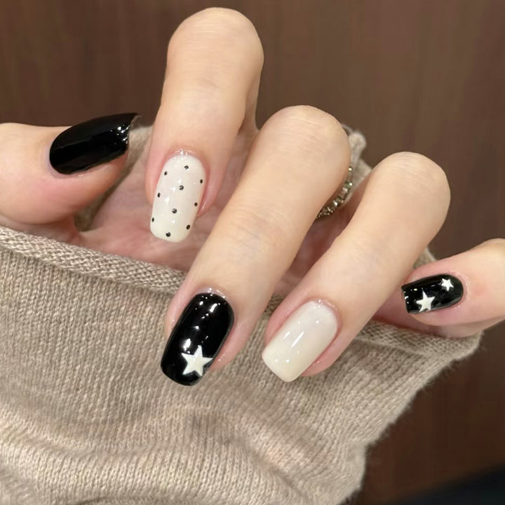 Artistic Press-On Nail Design with Stars and Polka Dots Kalsten