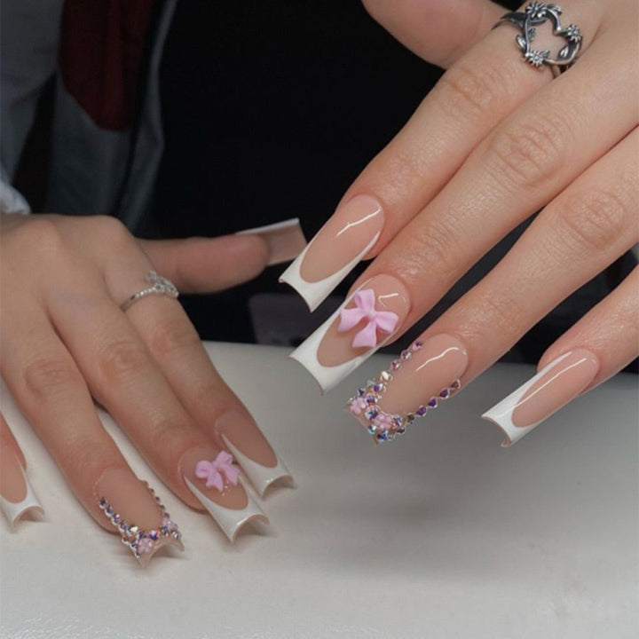 Artifical nail set with glamorous 3D bows and crystal embellishments Kalsten