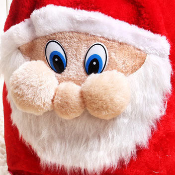 Festive gift bag with Santa Claus motif