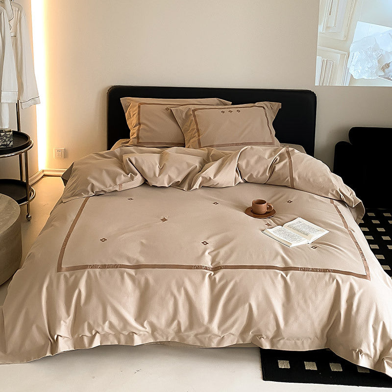 Luxurious cotton satin bedding set with embroidered border edge