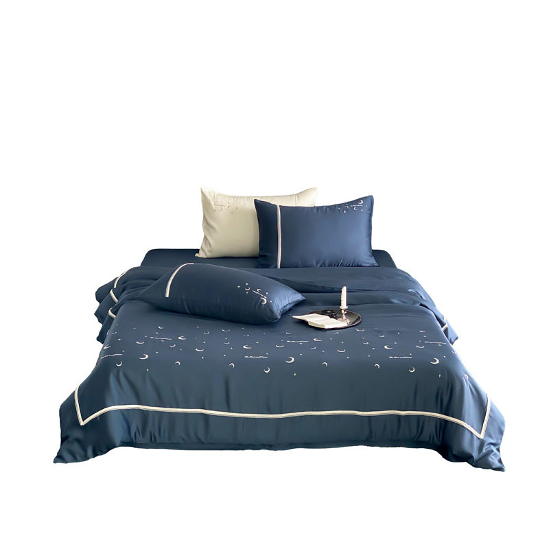 Silky shiny satin bed linen set with subtle moon and star motif