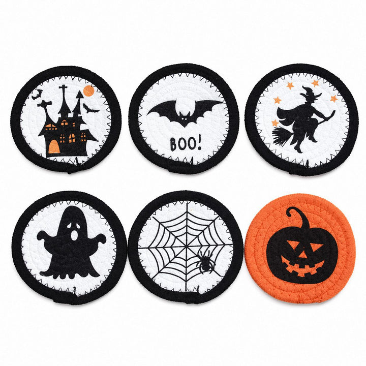 Round felt and cotton coasters with embroidered Halloween haunted house motif