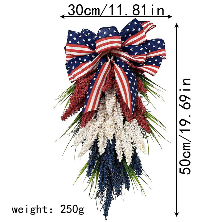 Unisex hanging floral swag with large bow and artificial berry branches Kalsten
