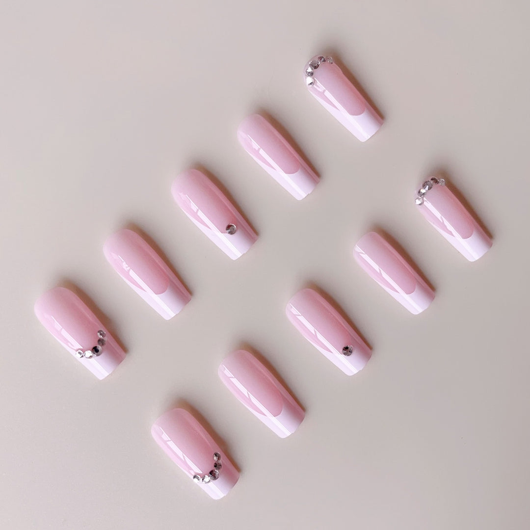 Acrylic nail set with elegant high-gloss finish and luxury rhinestone embellishments Kalsten