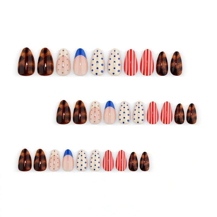 Fake nails in playful design with dots and stripes Kalsten