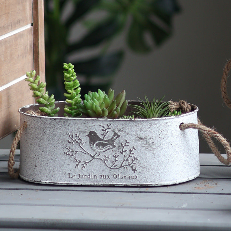Decorative storage basket made of metal with natural design Kalsten