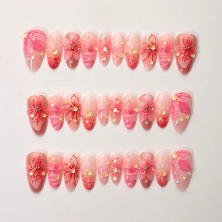 Artificial nail set with floral designs and sparkling accents Kalsten