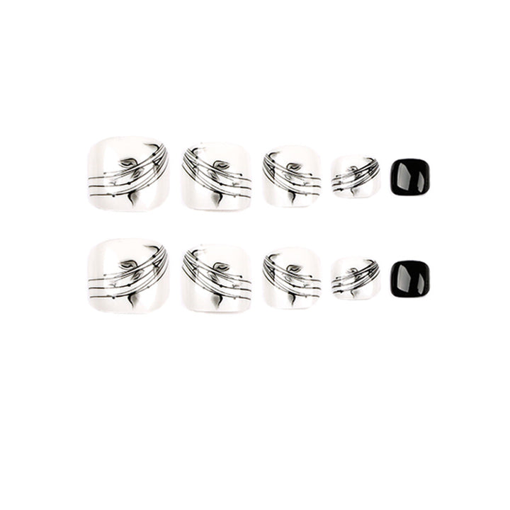 Artful toenail art in elegant black and white design Kalsten