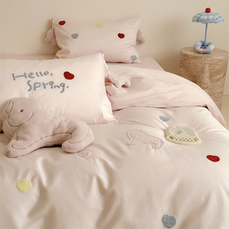 Reversible cotton satin bedding with embroidered heart appliqués and silky-matte finish Kalsten