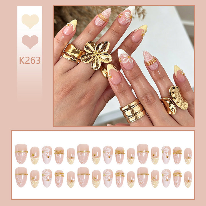 Artful nail tips with floral design Kalsten
