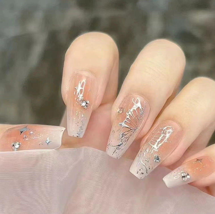 Elegant nail design with pearl embellishment Kalsten