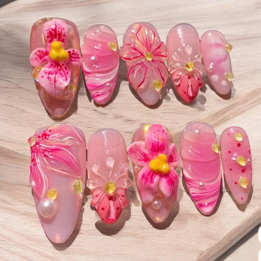 Artificial nail set with floral designs and sparkling accents Kalsten