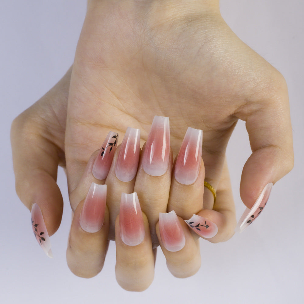 Press-on nails in elegant ombre design with floral accents Kalsten