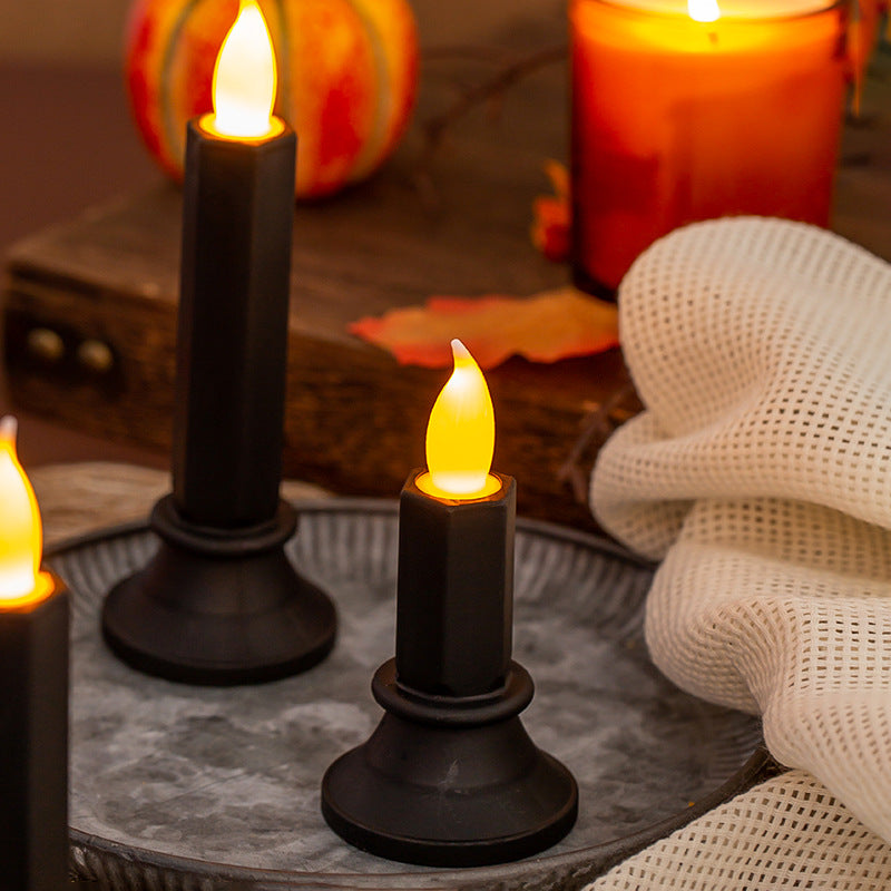 Flickering LED pillar candle in real wax look with removable holder
