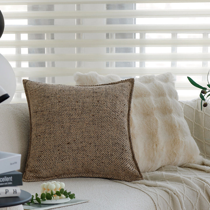 Square decorative cushion cover made of coarse woven bouclé with fine piping Kalsten