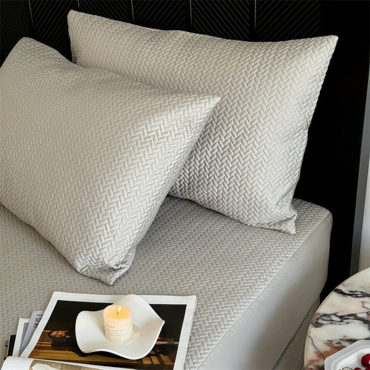 Comfort mattress topper with textured waffle surface and deep edge