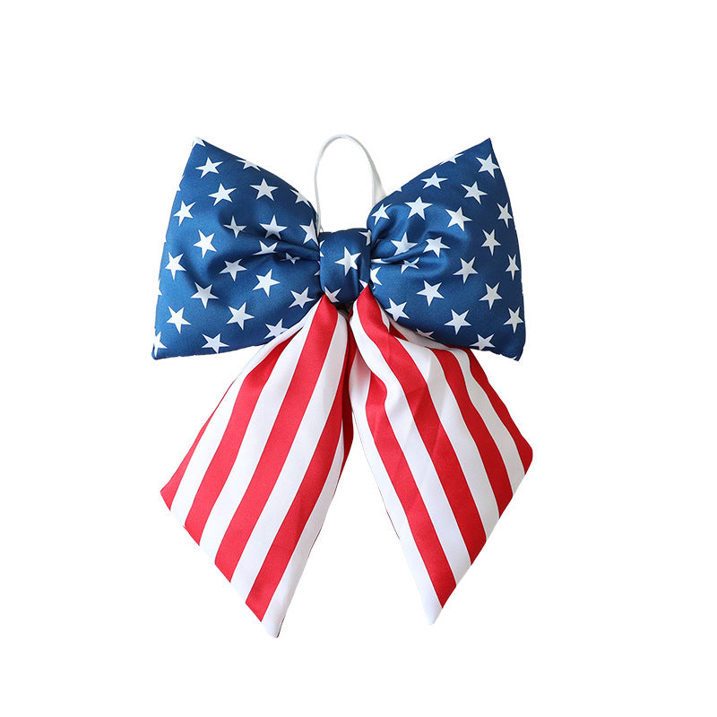 Women with large bow hair clip featuring patriotic star stripe motif Kalsten