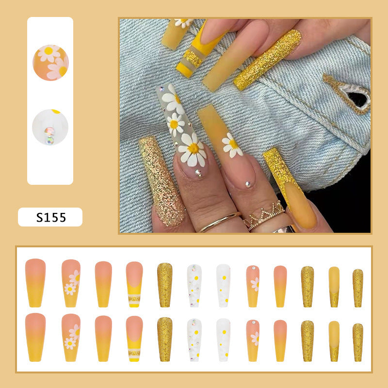 Artificial nail set with colorful sunflower designs and glittering accents Kalsten