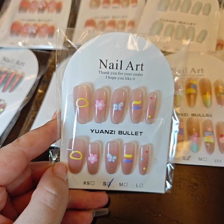 Decorative Press-On Nail Art Set with Floral and Patterned Designs