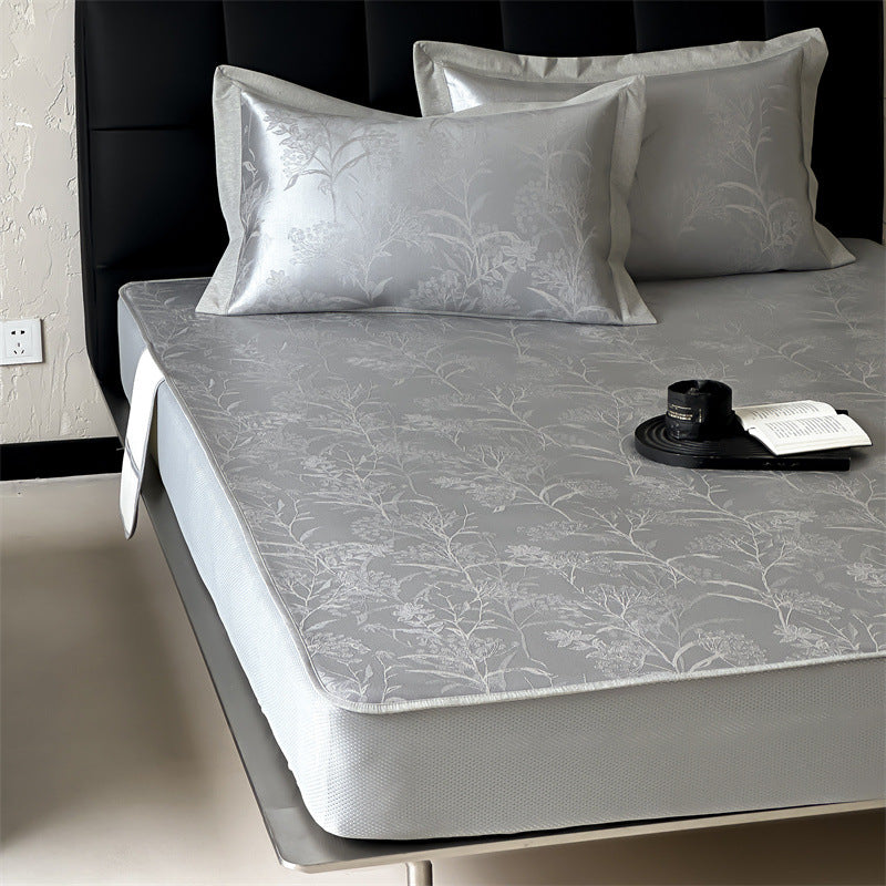 Finely woven satin fitted sheet with floral jacquard relief and reinforced all-round elastic