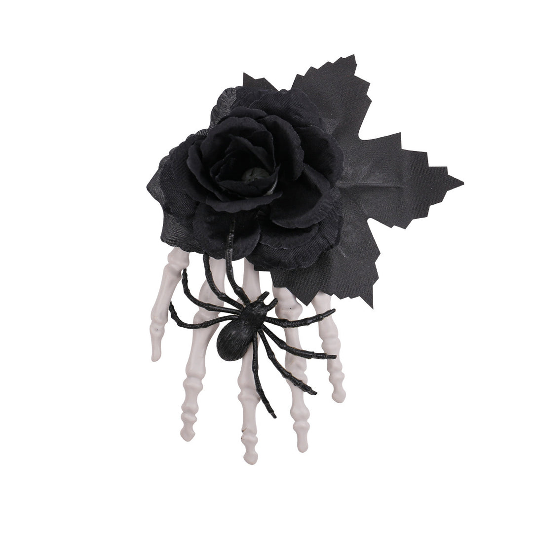 Gothic hair clip with fabric rose, skeleton fingers, and spider appliqué