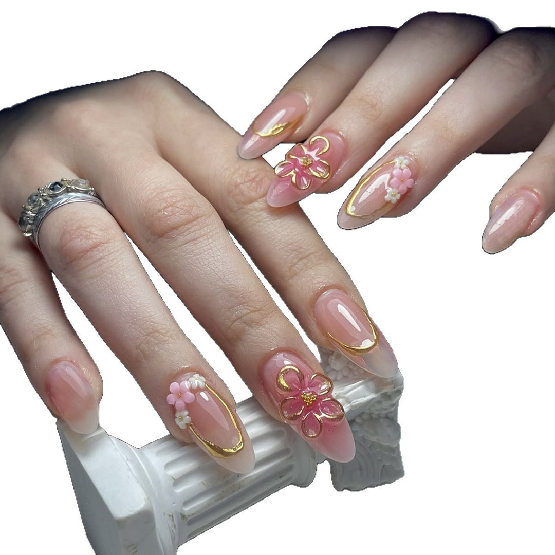 Acrylic nail set with elegant flower and gold decorations Kalsten