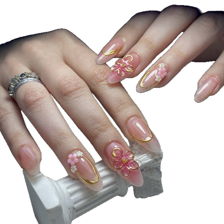 Acrylic nail set with elegant flower and gold decorations Kalsten