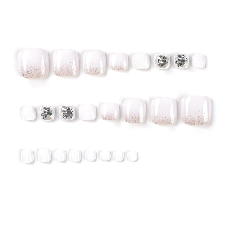 Artful toenail design with sparkling embellishments Kalsten