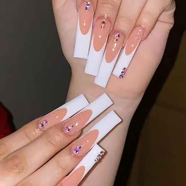 Nail set with elegant French tips and sparkling rhinestone embellishments Kalsten