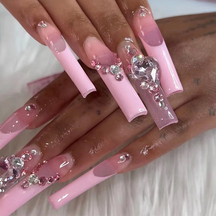 Glamorous nail extensions with glitter embellishments Kalsten