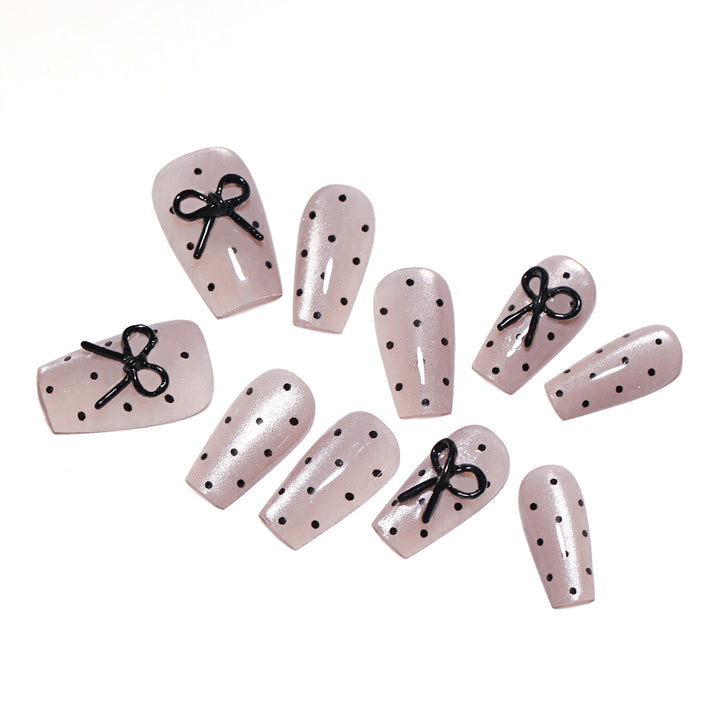 Artful Nail Extensions with Bow Pattern Kalsten