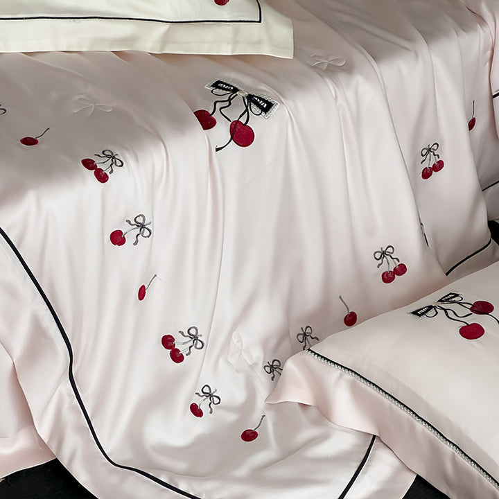 Cotton satin bedding set with cherry embroidery and contrasting piping