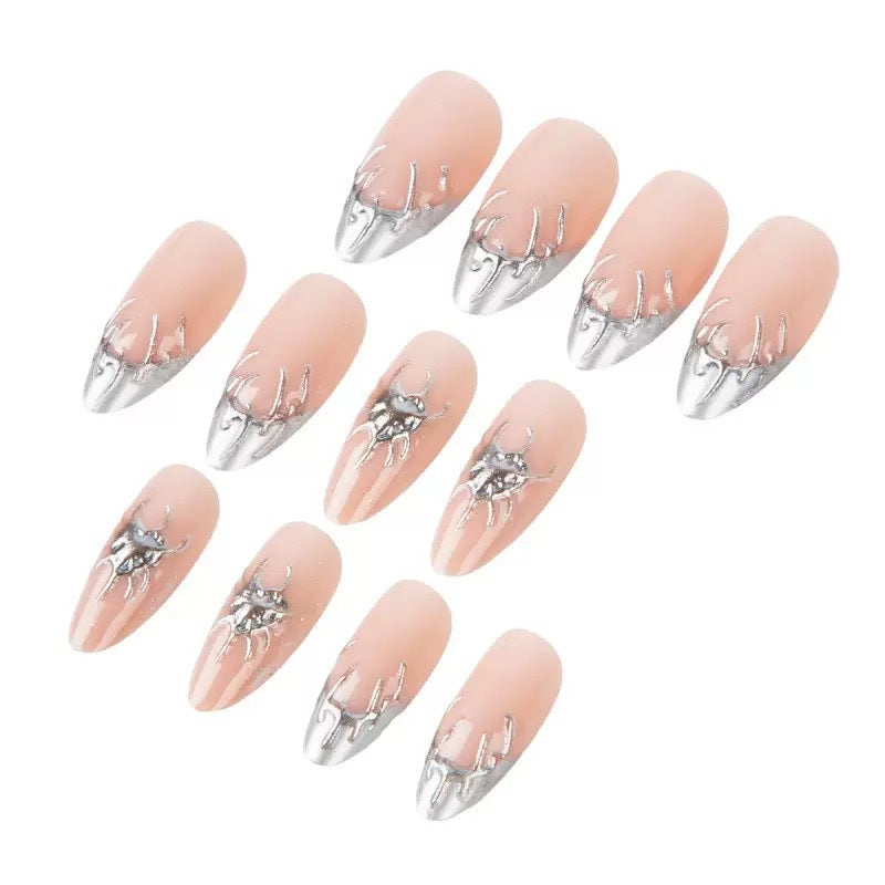 Creative Nail Art with Stylish Metallic Finish Kalsten