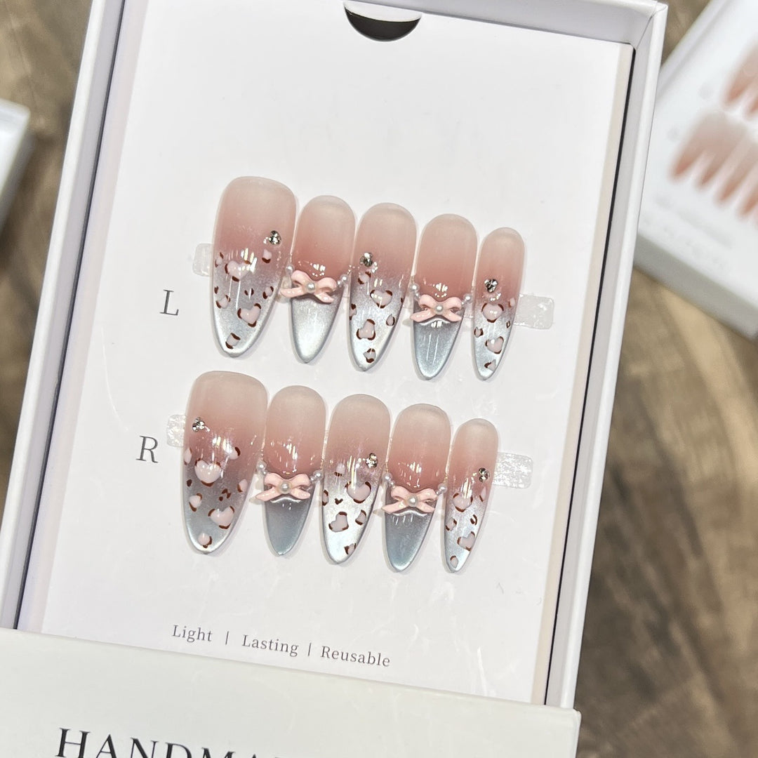 Decorative Press-On Nail Design with Bow Accents Kalsten