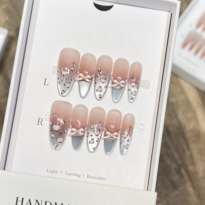 Decorative Press-On Nail Design with Bow Accents Kalsten