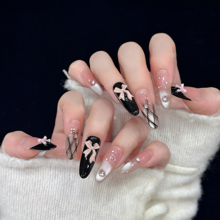 Artificial nail tips with elegant bows and glitter details Kalsten