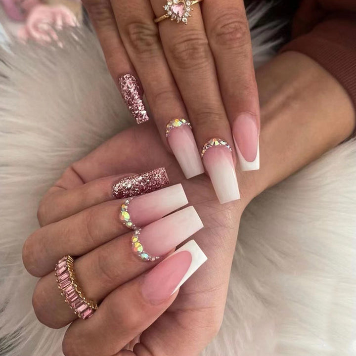 Glamorous artificial nails with rhinestone accents Kalsten