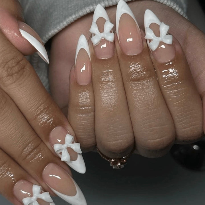 Artificial nail set with elegant tips and delicate bow decorations Kalsten