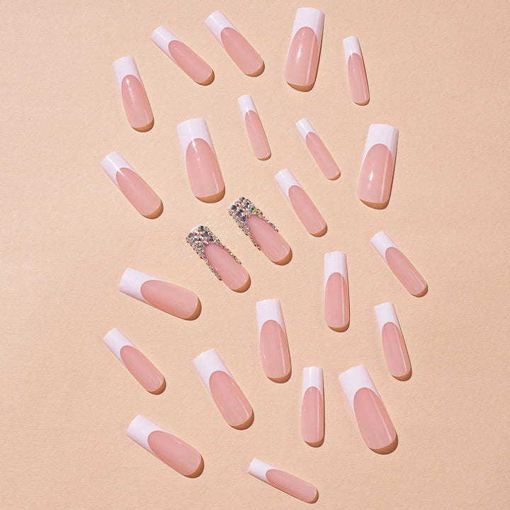 Acrylic nail set with filigree accents and glitter embellishments Kalsten