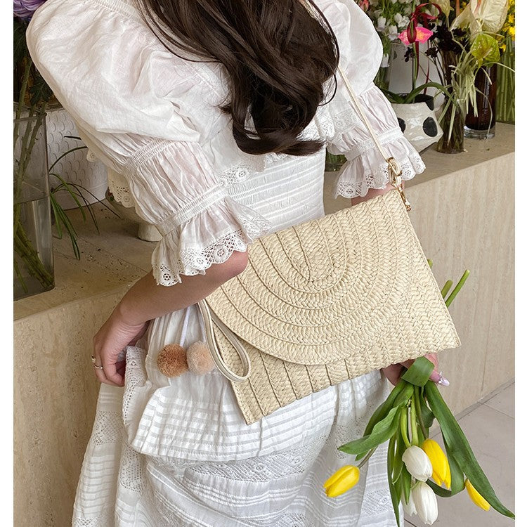 Braided shoulder bag with creative pom poms Kalsten