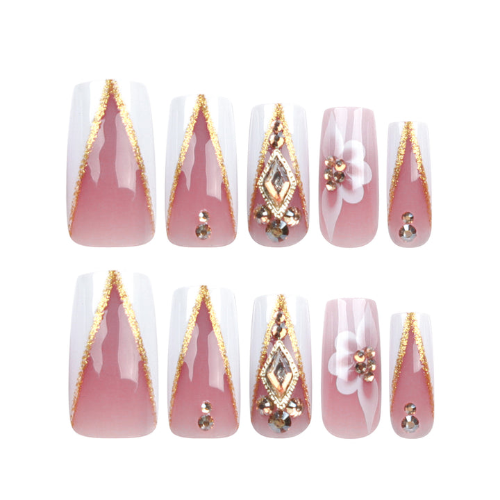 Artistic nail extensions with floral and glitter accents Kalsten