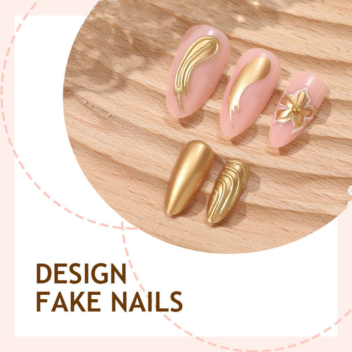 Creative nail art set with luxurious gold embellishments Kalsten