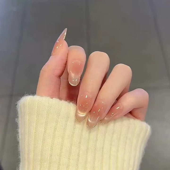 Artificial nails in elegant French manicure design Kalsten