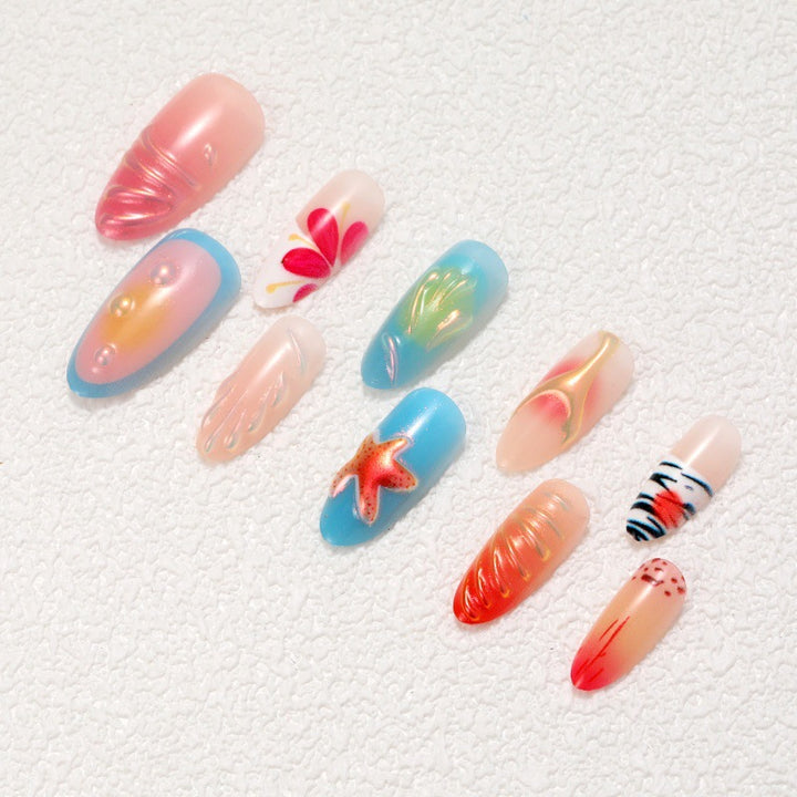 Artistic nail tips with maritime motifs Kalsten