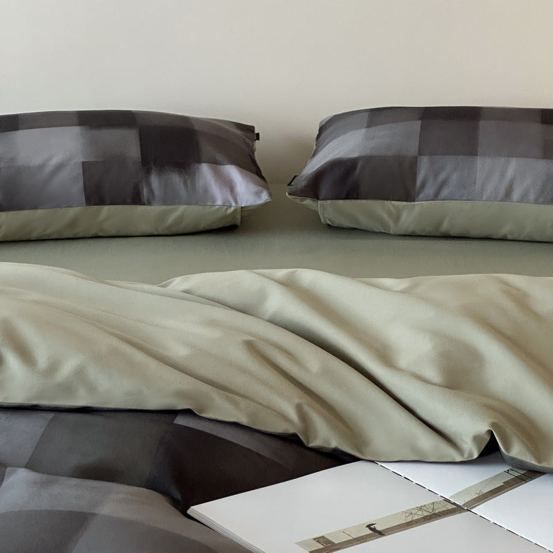Reversible cotton satin bedding set with fine striped pattern and contrasting backside