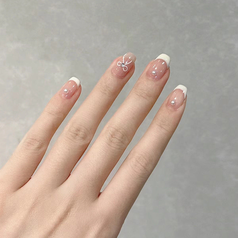 Decorative French Tip Press-On Nail Set with Bow Accents Kalsten
