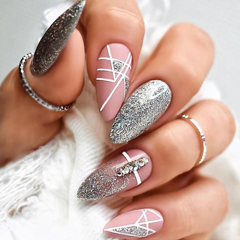 Artful nail extensions with glitter and geometric designs Kalsten